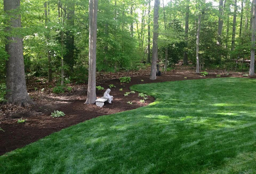 Image of impressive rounded front steps installed by JMC Landscaping