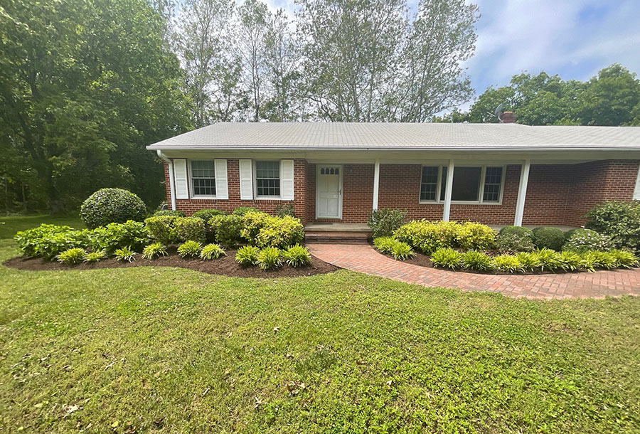Image of a spring clean up and mulch refresh by JMC Landscaping